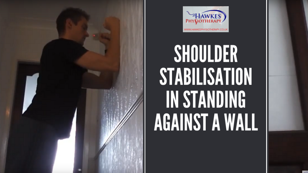 Shoulder stabilisation in standing against a wall
